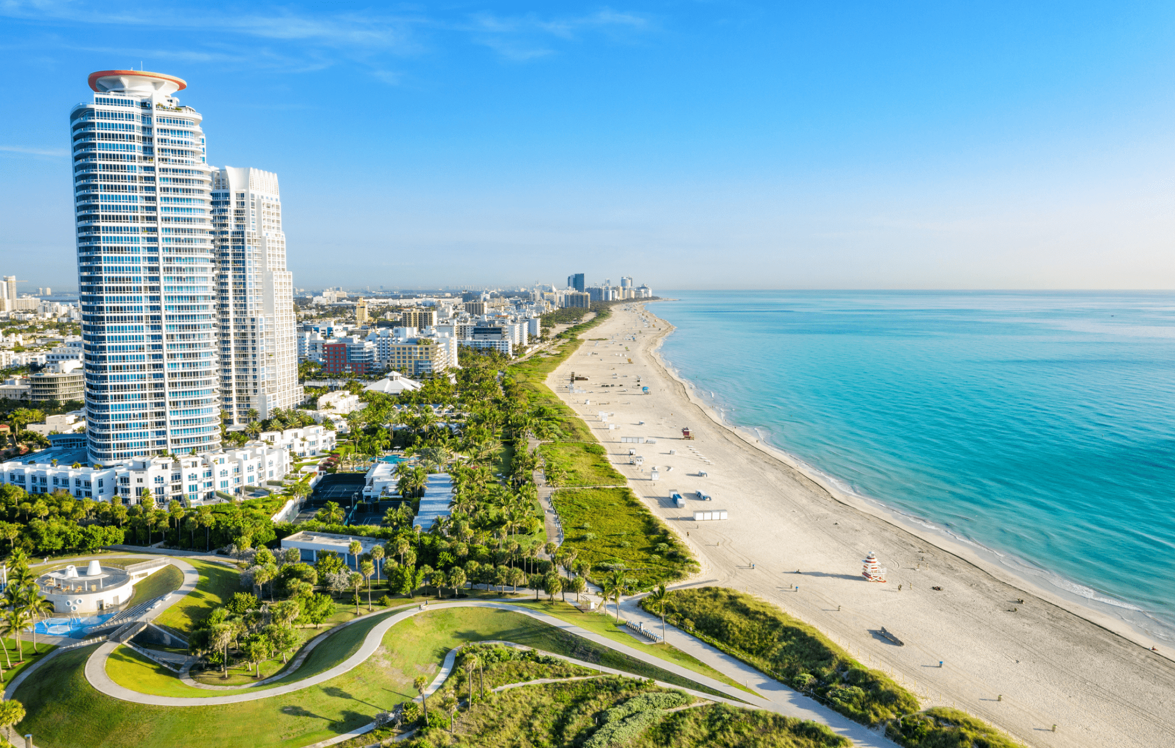 PC1 Beautiful Miami seashore with clear blue waters and sandy beach, bus route map