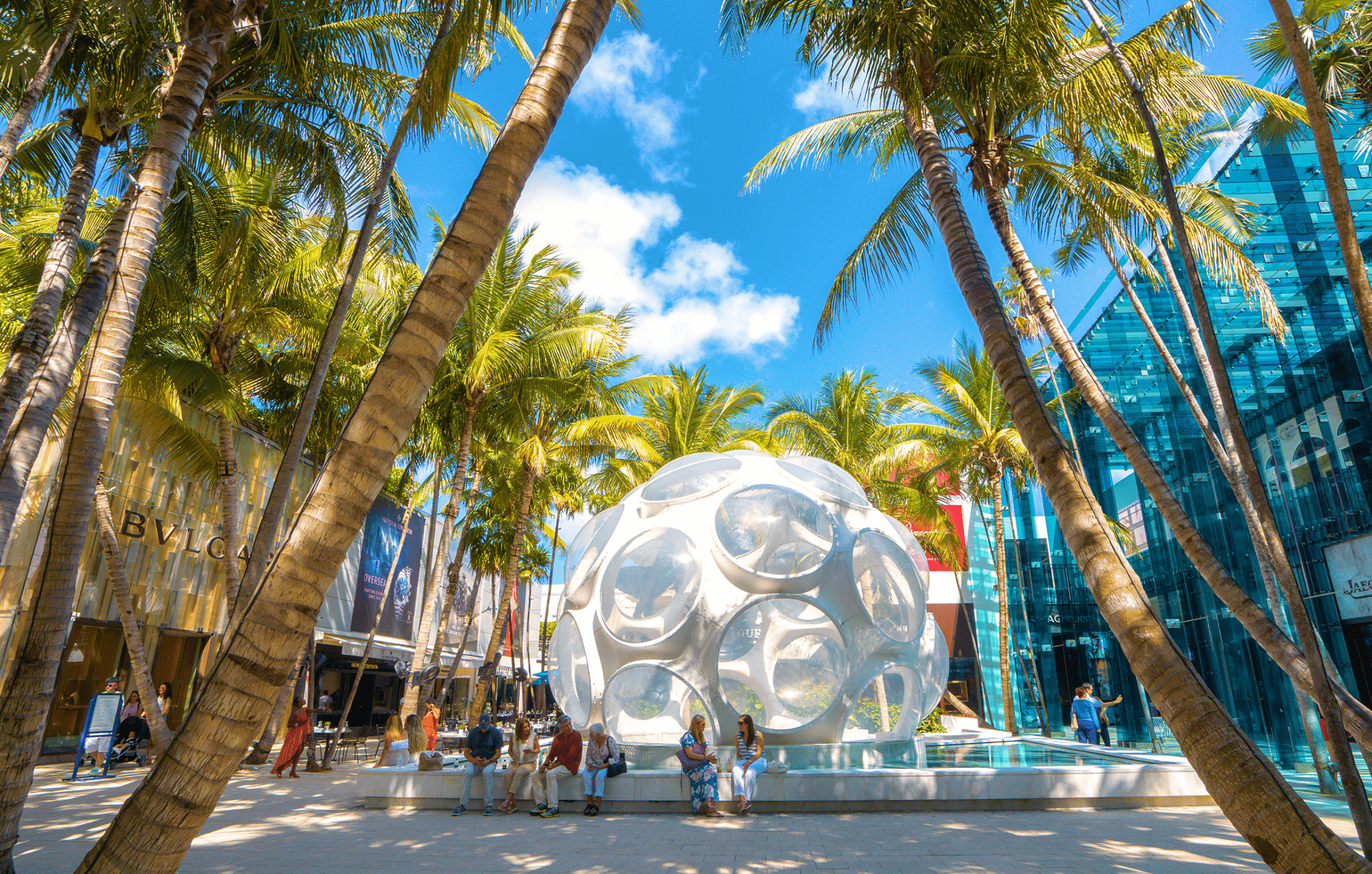 PC5 Buckminster Fuller's Fly's Eye Dome with people gathered around the iconic geodesic dome, bus route map